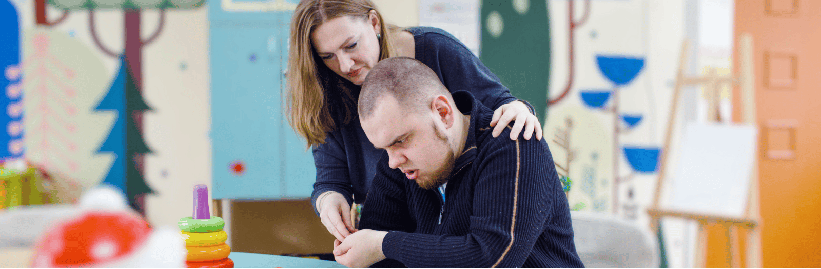 an adolescent working with a clinician to determine an autism diagnosis